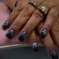 Navy ombre nails with silver glitter feature