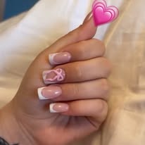 Soft pink French manicure with delicate heart art